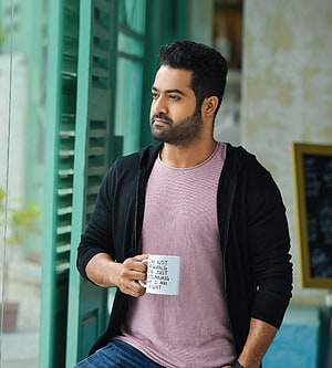 Jr NTR Holding White Mug With Text In Black Hoodie And Pink T-Shirt HD phone wallpaper