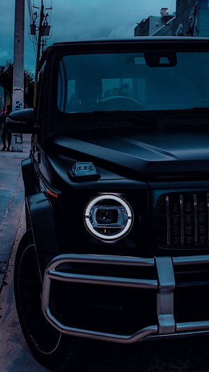 Matte Black Mercedes-AMG G63 G-Wagon Front Grille and Headlight Detail HD phone wallpaper