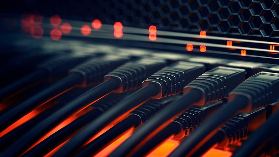 Close-up of network cables plugged into a server rack with glowing red indicator lights HD wallpaper