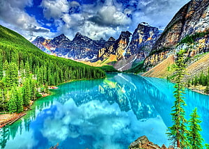 Turquoise Mountain Lake Reflections in a Dense Conifer Forest Landscape HD wallpaper