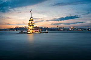 Maiden's Tower at Dusk with Istanbul Skyline and Bosphorus Waterfront HD wallpaper
