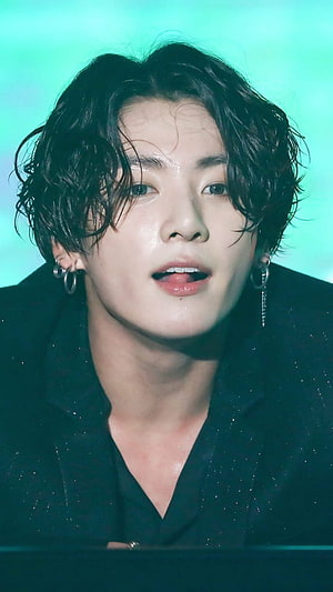 Jungkook BTS Portrait With Wavy Hair And Silver Earrings On Stage HD phone wallpaper