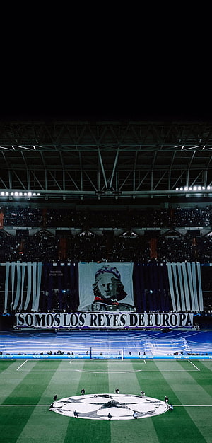 Real Madrid Champions League tifo display with Napoleon portrait and Somos Los Reyes de Europa banner at stadium HD phone wallpaper