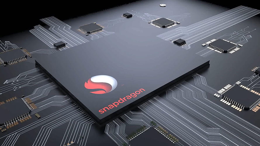 Qualcomm Snapdragon Processor Chip on Circuit Board with Red Logo and Traces HD wallpaper