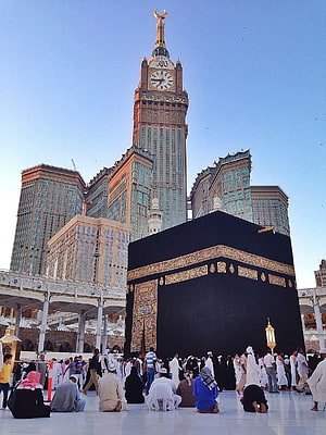 Kaaba and Abraj Al Bait Clock Tower in Mecca with Pilgrims Praying HD phone wallpaper