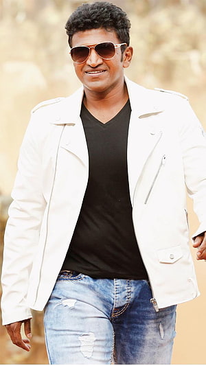 Puneeth Rajkumar in White Jacket and Aviator Sunglasses HD phone wallpaper
