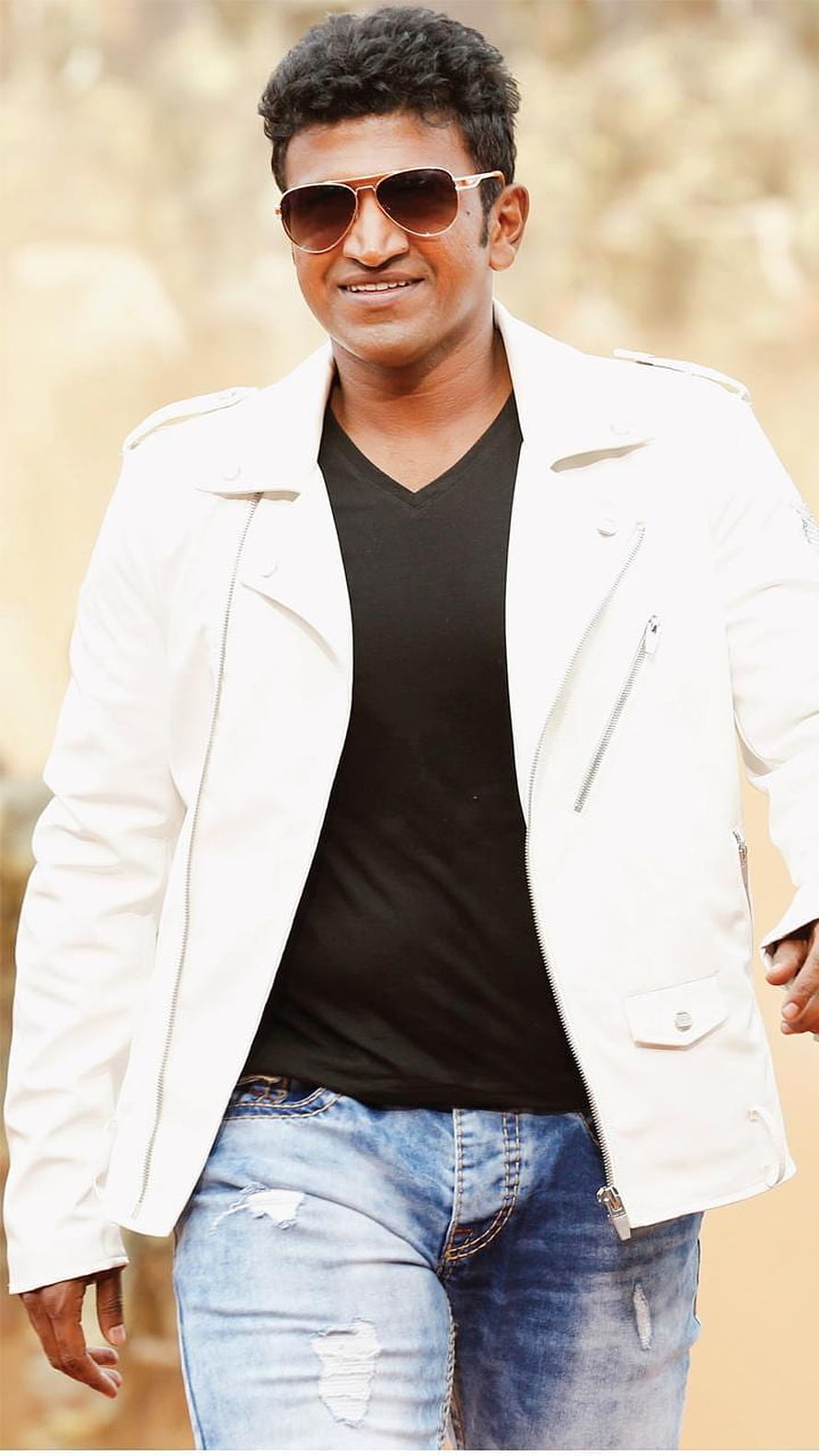 Puneeth Rajkumar in White Jacket and Aviator Sunglasses HD phone wallpaper