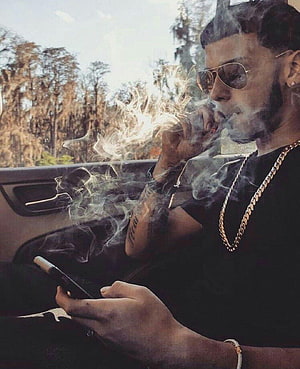 Man Smoking Vape in Car with Sunglasses and Gold Chain, Anuel AA, real hasta la muerte HD phone wallpaper