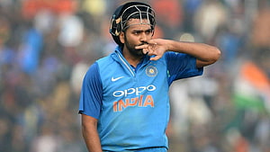 Rohit Sharma in Indian Cricket Team Jersey Making a Gesture on the Field HD wallpaper
