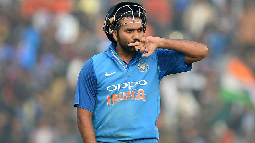 Rohit Sharma in Indian Cricket Team Jersey Making a Gesture on the Field HD wallpaper