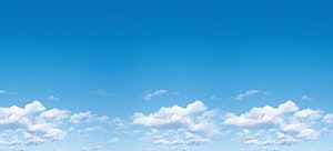 Serene Blue Sky with Fluffy White Clouds for a Peaceful Desktop Background HD wallpaper