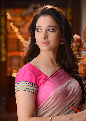 Tamanna Bhatia in a vibrant pink and silver saree with traditional gold jewelry HD phone wallpaper