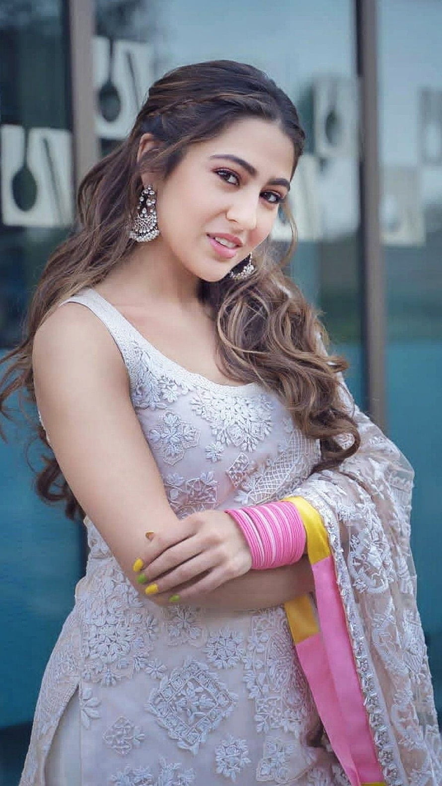 Surbhi Chandna in elegant white embroidered outfit with pink bangles and jewelry HD phone wallpaper