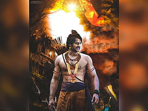 Prabhas as Lord Ram in Adipurush with bow and arrows against fiery backdrop HD wallpaper
