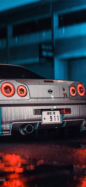 Nissan Skyline GT-R R34 Rear View in Moody Blue and Red Neon Lighting HD phone wallpaper