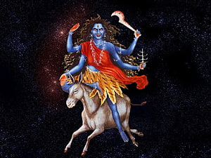 Maa Kalratri Riding a Donkey Against a Starry Night Sky HD wallpaper