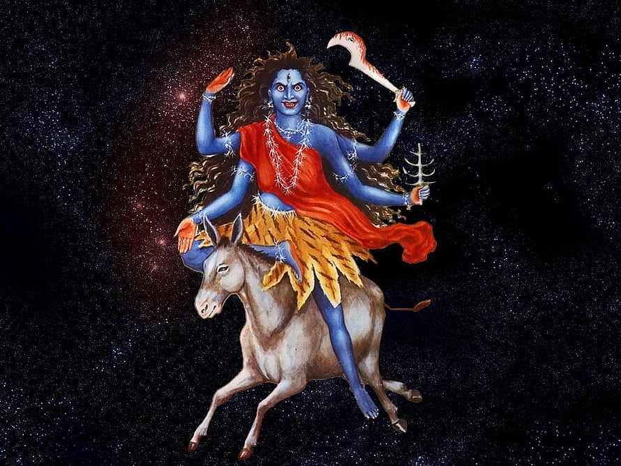 Maa Kalratri Riding a Donkey Against a Starry Night Sky HD wallpaper
