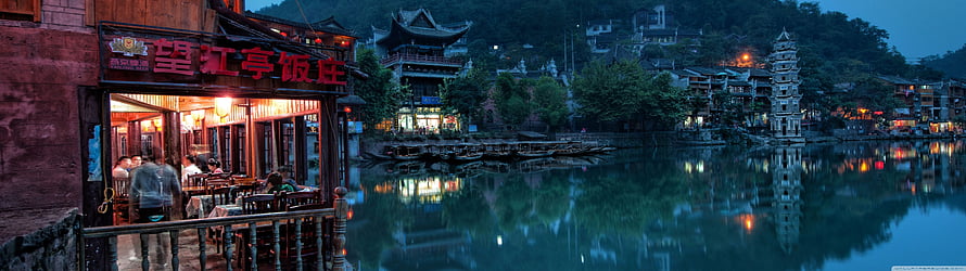 Fenghuang Ancient Town Riverside Night View with Traditional Chinese Architecture and River Reflections HD wallpaper