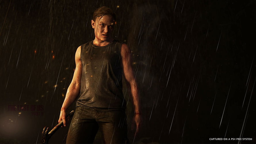 Abby Anderson from The Last of Us Part II standing in heavy rain holding a weapon in a dark cinematic scene HD wallpaper