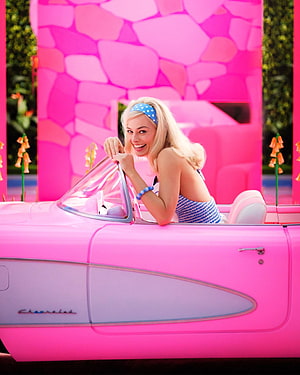 Barbie in a Pink Chevrolet Corvette Convertible with Blue Polka Dot Headband HD phone wallpaper