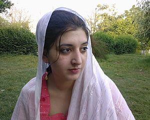 Portrait of a young woman wearing a white dupatta and pink traditional outfit in a garden, 4 Pakistani Girl for Computer, local girl HD wallpaper