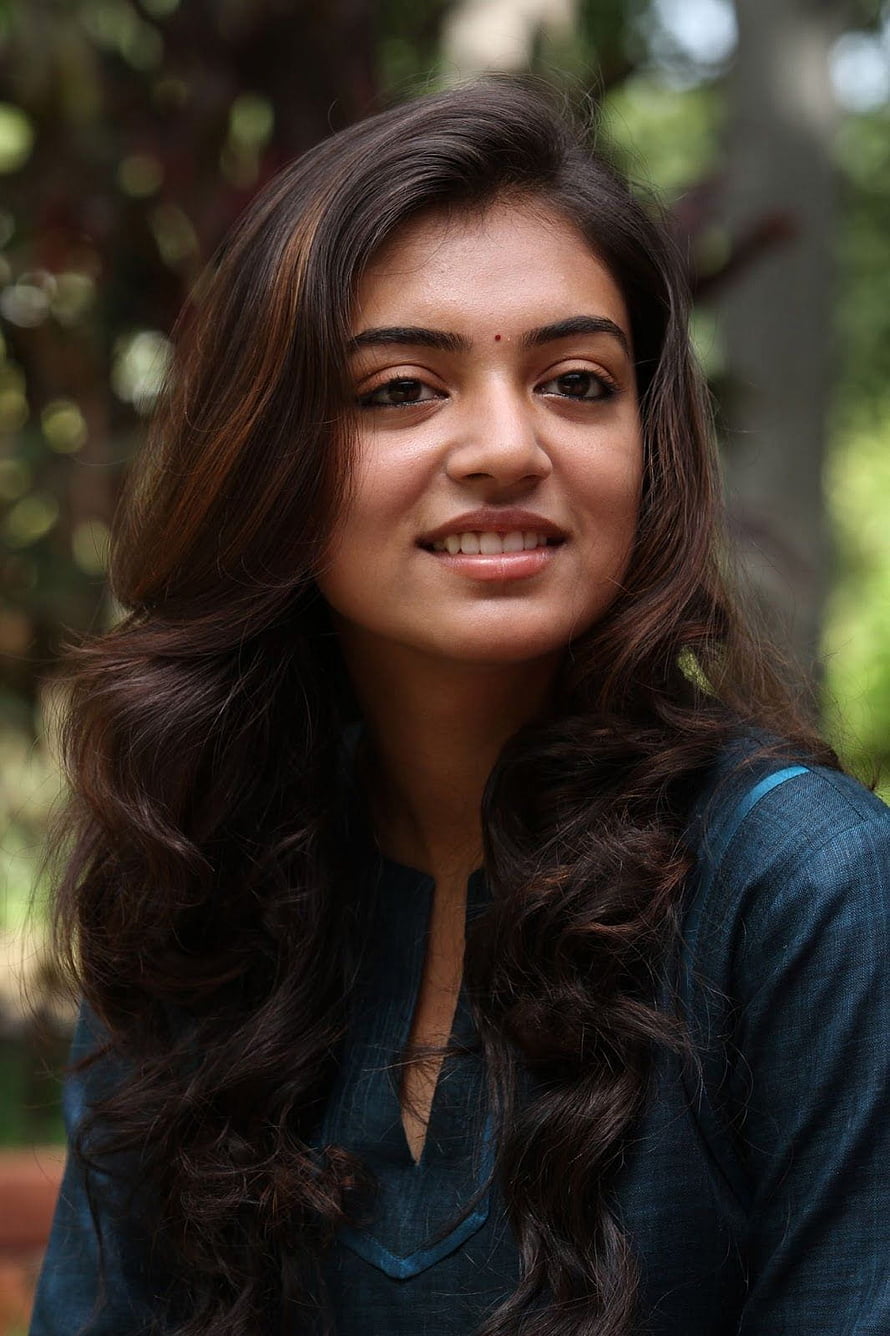 Nazriya Nazim Portrait with Long Wavy Hair and Teal Top in Natural Outdoor Setting HD phone wallpaper