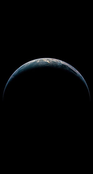 Earth Horizon Rising From Deep Space Against Black Void HD phone wallpaper