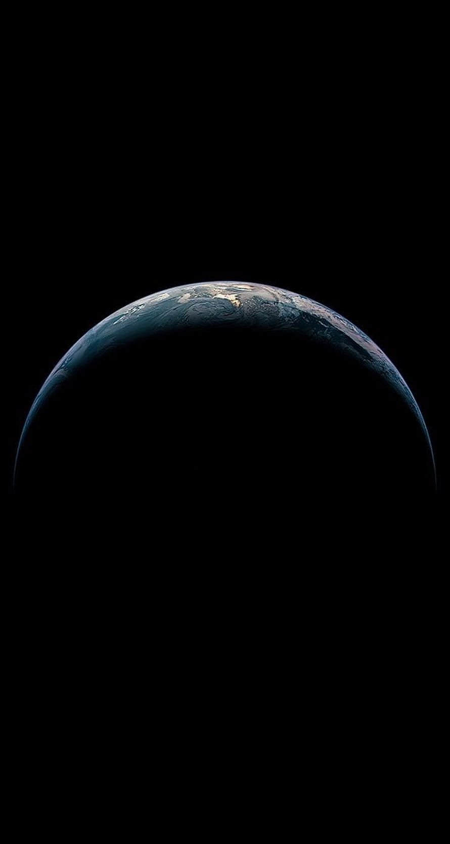 Earth Horizon Rising From Deep Space Against Black Void HD phone wallpaper