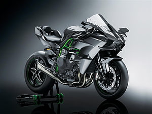 Kawasaki Ninja H2R Superbike in Matte Silver and Green on Studio Display Stand HD wallpaper