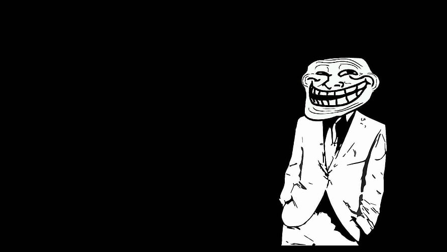 Troll Face Meme Character in a White Suit on Black Background HD wallpaper