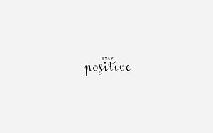 Minimalist Stay Positive Calligraphy Quote on Clean White Background HD wallpaper