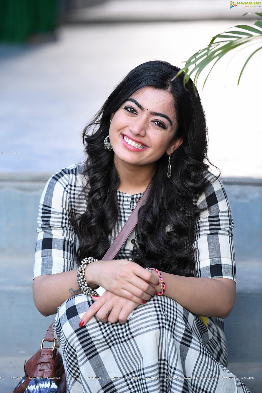 Rashmika Mandanna in a Black and White Checkered Outfit with Long Wavy Hair HD phone wallpaper