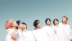 Enhypen Members in White Shirts Against Clear Blue Sky HD wallpaper