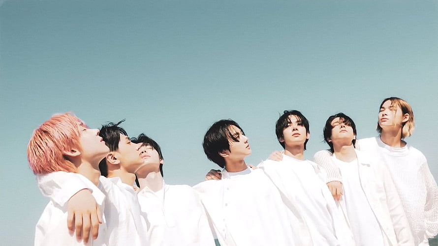 Enhypen Members in White Shirts Against Clear Blue Sky HD wallpaper