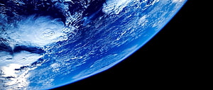 Planet Earth View From Space With Swirling Clouds And Deep Blue Oceans HD wallpaper