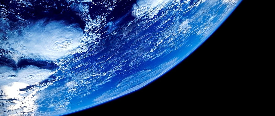 Planet Earth View From Space With Swirling Clouds And Deep Blue Oceans HD wallpaper