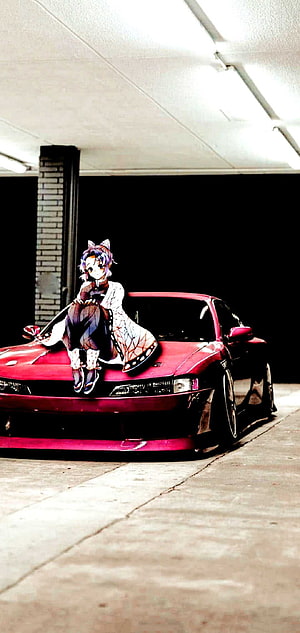 Anime Girl Sitting on a Red JDM Sports Car in a Parking Garage HD phone wallpaper