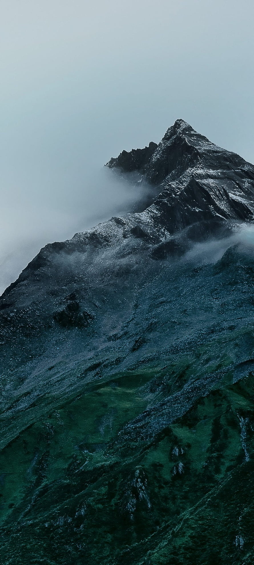 Majestic Snow-Capped Mountain Peak Rising Through Misty Clouds HD phone wallpaper