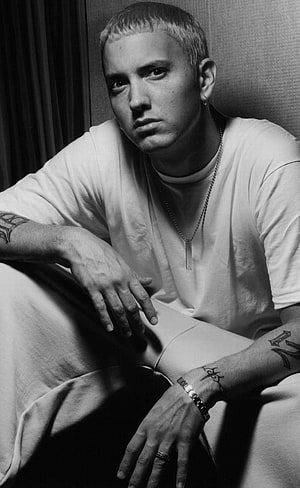 Eminem Black and White Portrait with Tattoos and Chain Necklace HD phone wallpaper