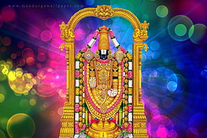 Lord Ayyappa Golden Idol With Flower Garlands And Bokeh Background HD wallpaper