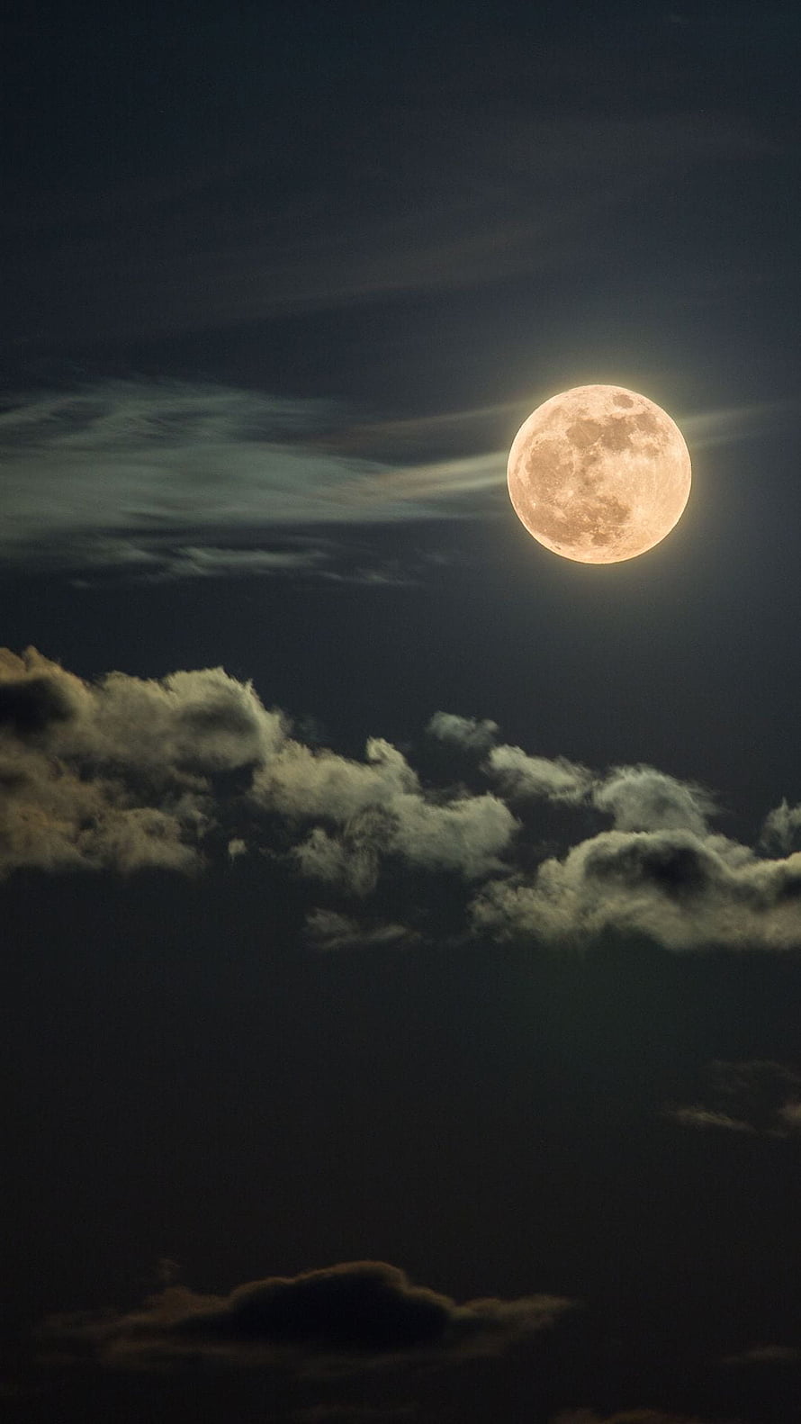 Glowing Full Moon Illuminating Dark Clouds in Night Sky HD phone wallpaper