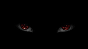 Glowing Red Eyes Peering From Pitch Black Darkness HD wallpaper