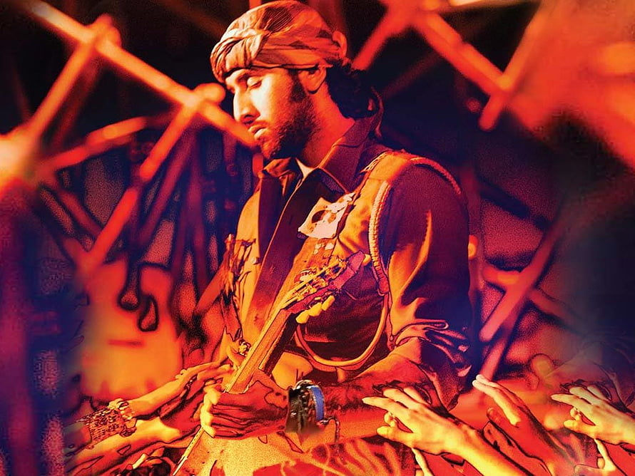 Ranbir Kapoor as a Rockstar Guitarist in Dramatic Red Stage Lighting HD wallpaper