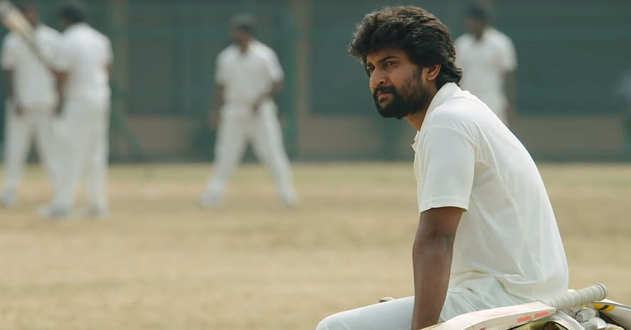 Jersey Movie Still: Bearded Cricketer in White Kit on Dusty Pitch HD wallpaper