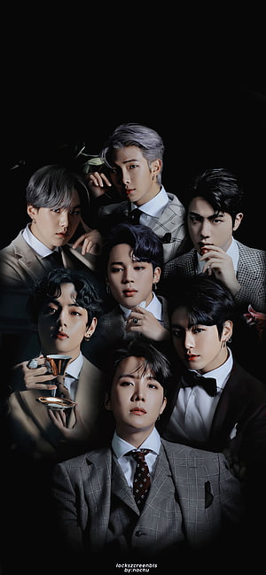 BTS members in formal suits and ties posing against a dark background HD phone wallpaper