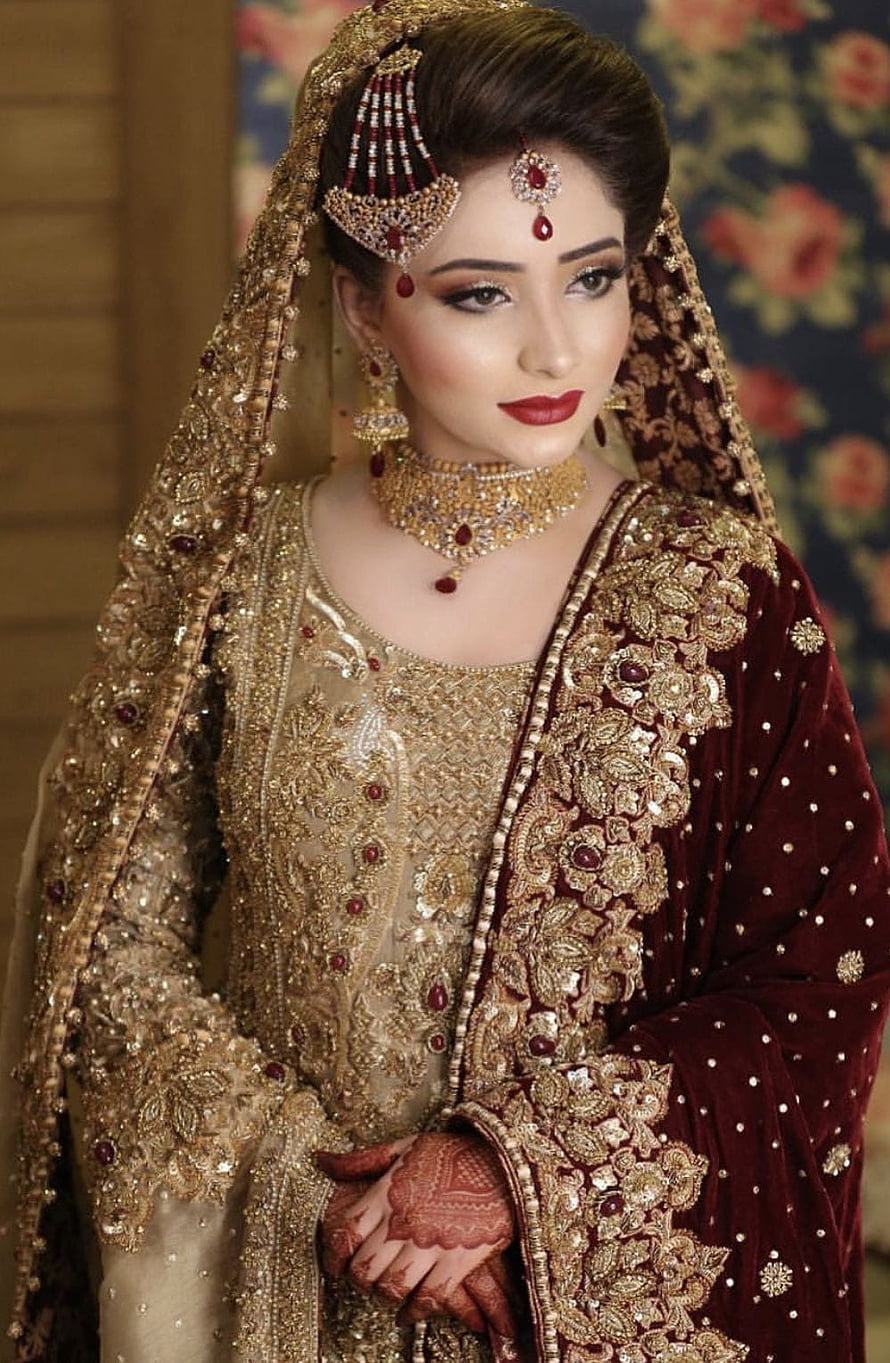 Elegant South Asian Bride in Maroon Velvet and Gold Embroidered Wedding Ensemble HD phone wallpaper
