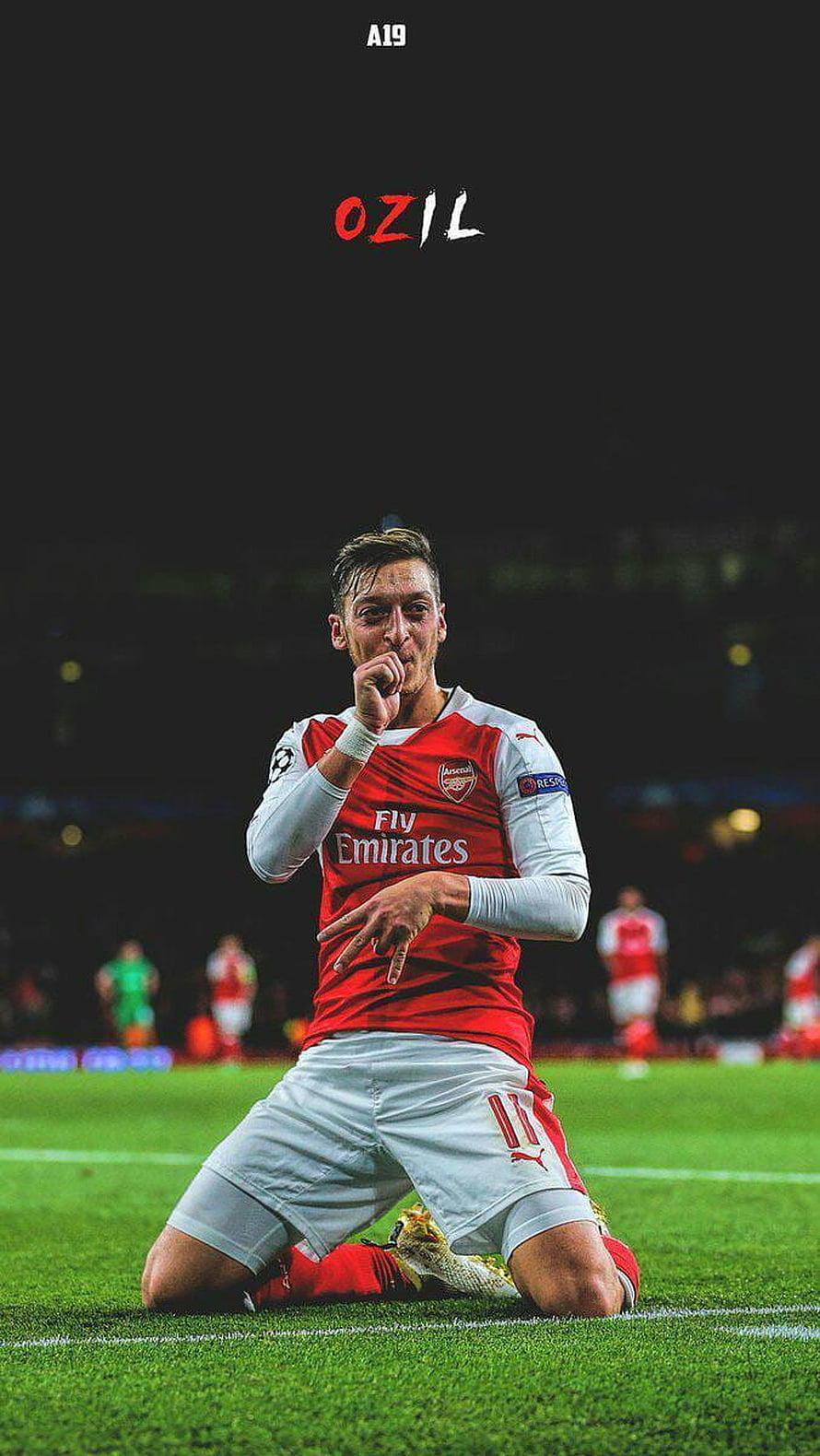 Mesut Ozil Kneeling on the Pitch in Arsenal Home Kit with Fly Emirates Sponsor HD phone wallpaper