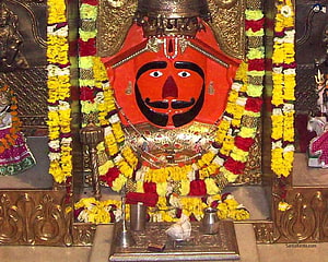 Salasar Balaji Temple Deity Adorned With Marigold Garlands And Gold Ornaments HD wallpaper