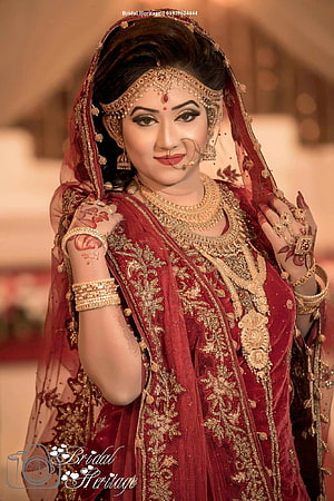 Elegant Indian Bride in Red Velvet Lehenga with Gold Jewelry and Henna HD phone wallpaper