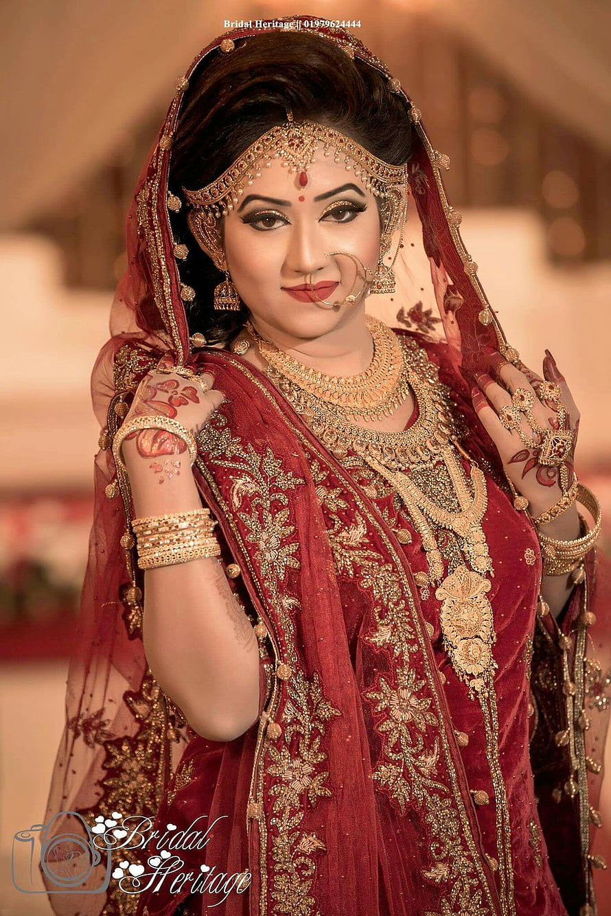Elegant Indian Bride in Red Velvet Lehenga with Gold Jewelry and Henna HD phone wallpaper